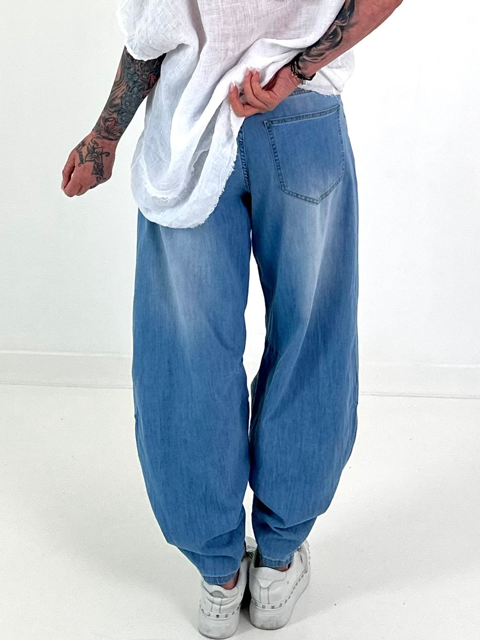 Jeans with gathered snap-button hem - denim