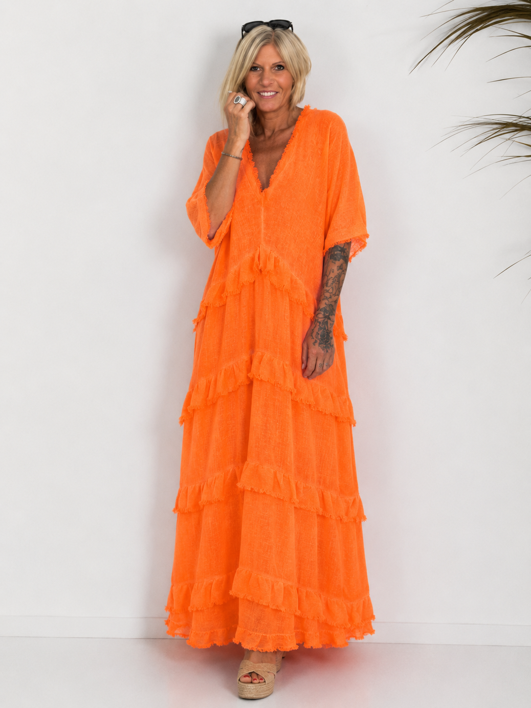 neon orange long sleeve dress Long dress with fringes and ruffles