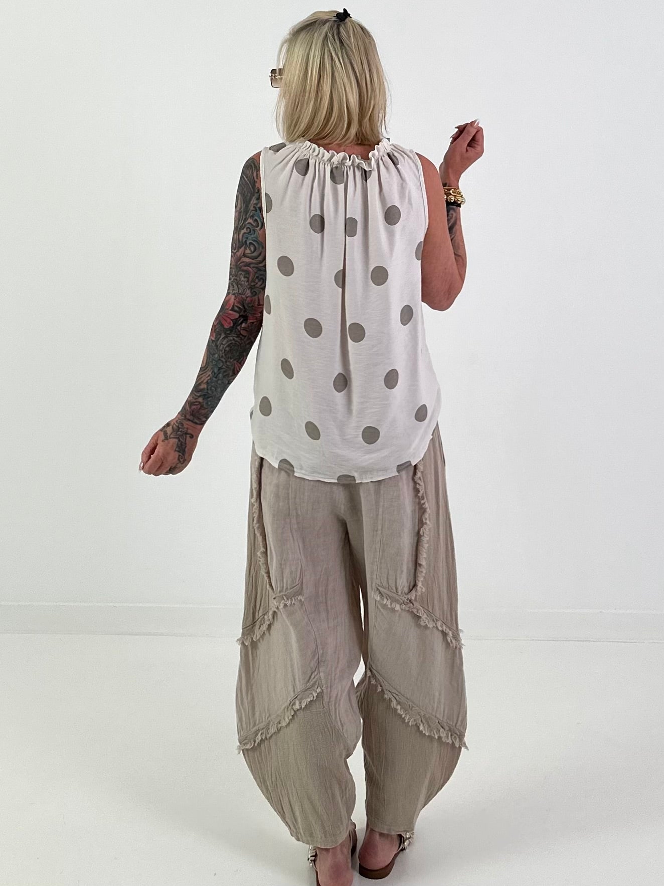 Polka dot top with ruffled collar - beige-taupe