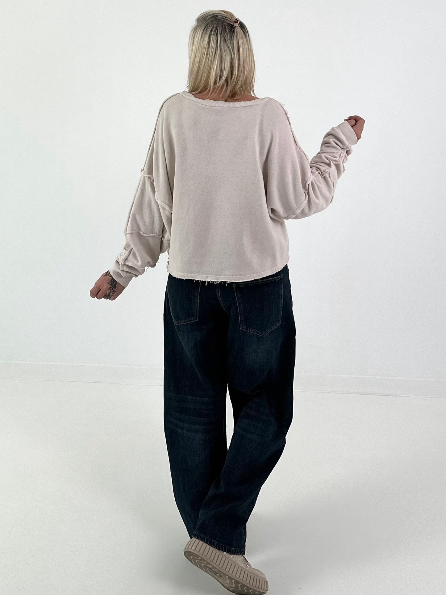 Sweater mit Linksnähten und Print - beige