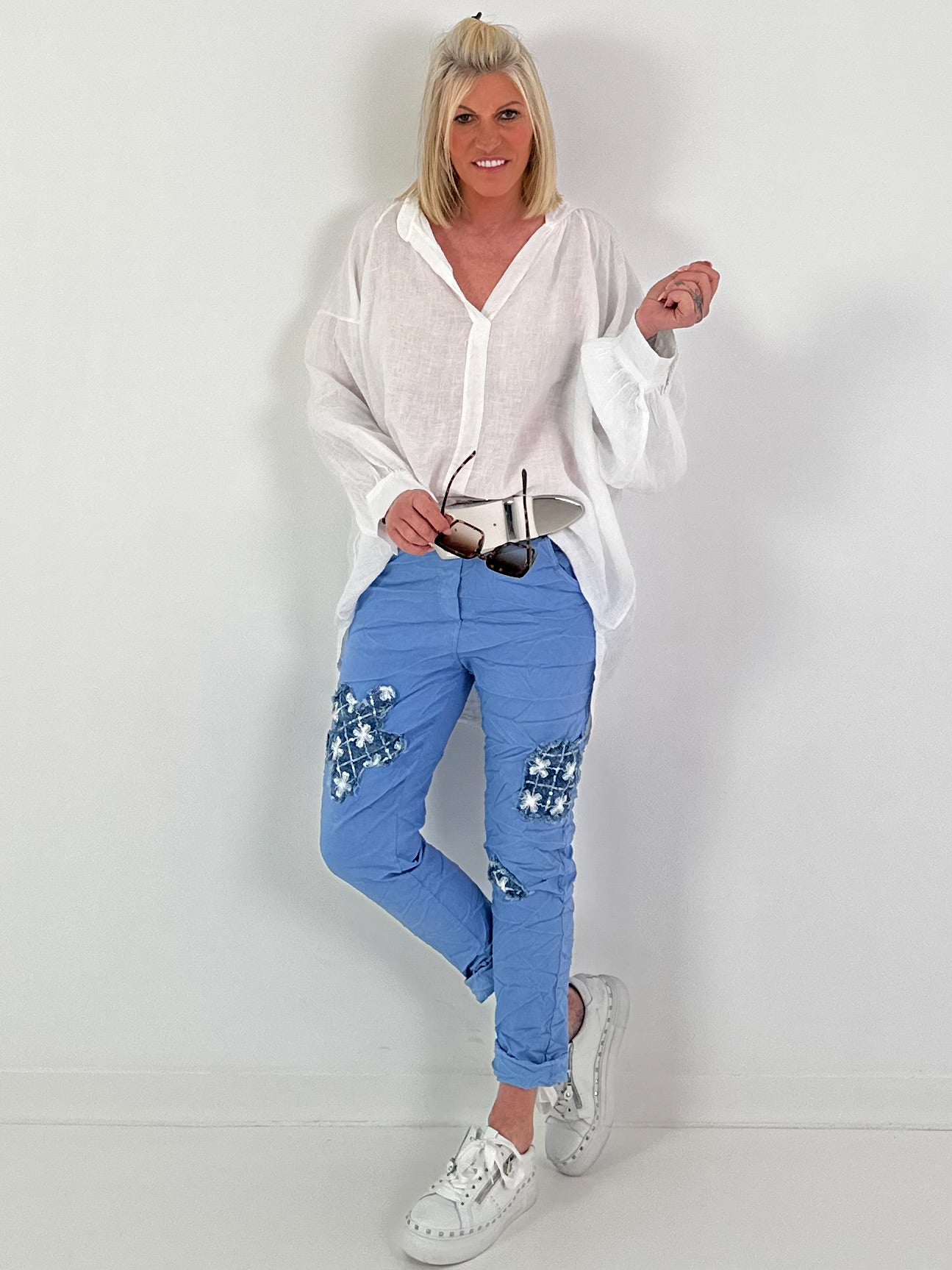 Light blue jeans with denim and sequin details