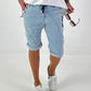 Short baggy jeans with eyelet details - light blue (available from 05/15/26)