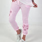 Trousers with crocheted flower inserts - pink