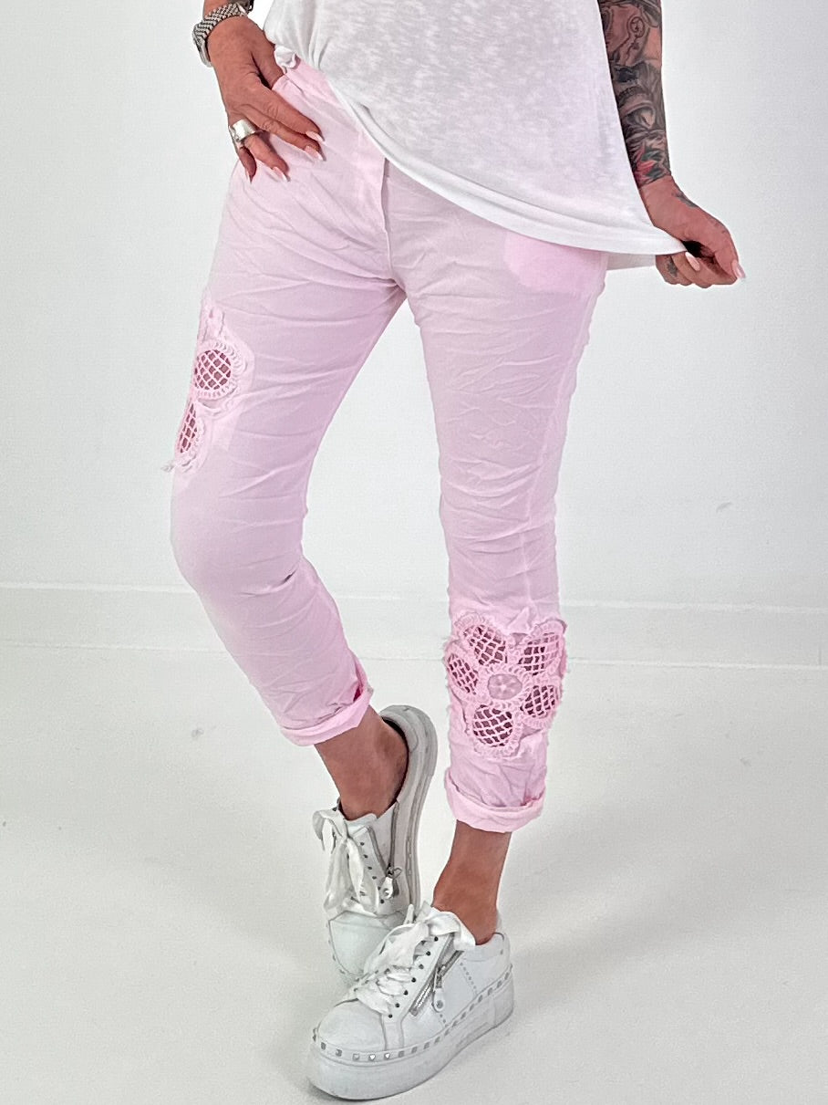 Trousers with crocheted flower inserts - pink