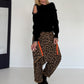 Pullover mit Cut-Outs und Statement-Perlen - schwarz