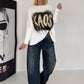 Sweater mit Stulpenärmeln und Strassmotiv KAOS - ecru