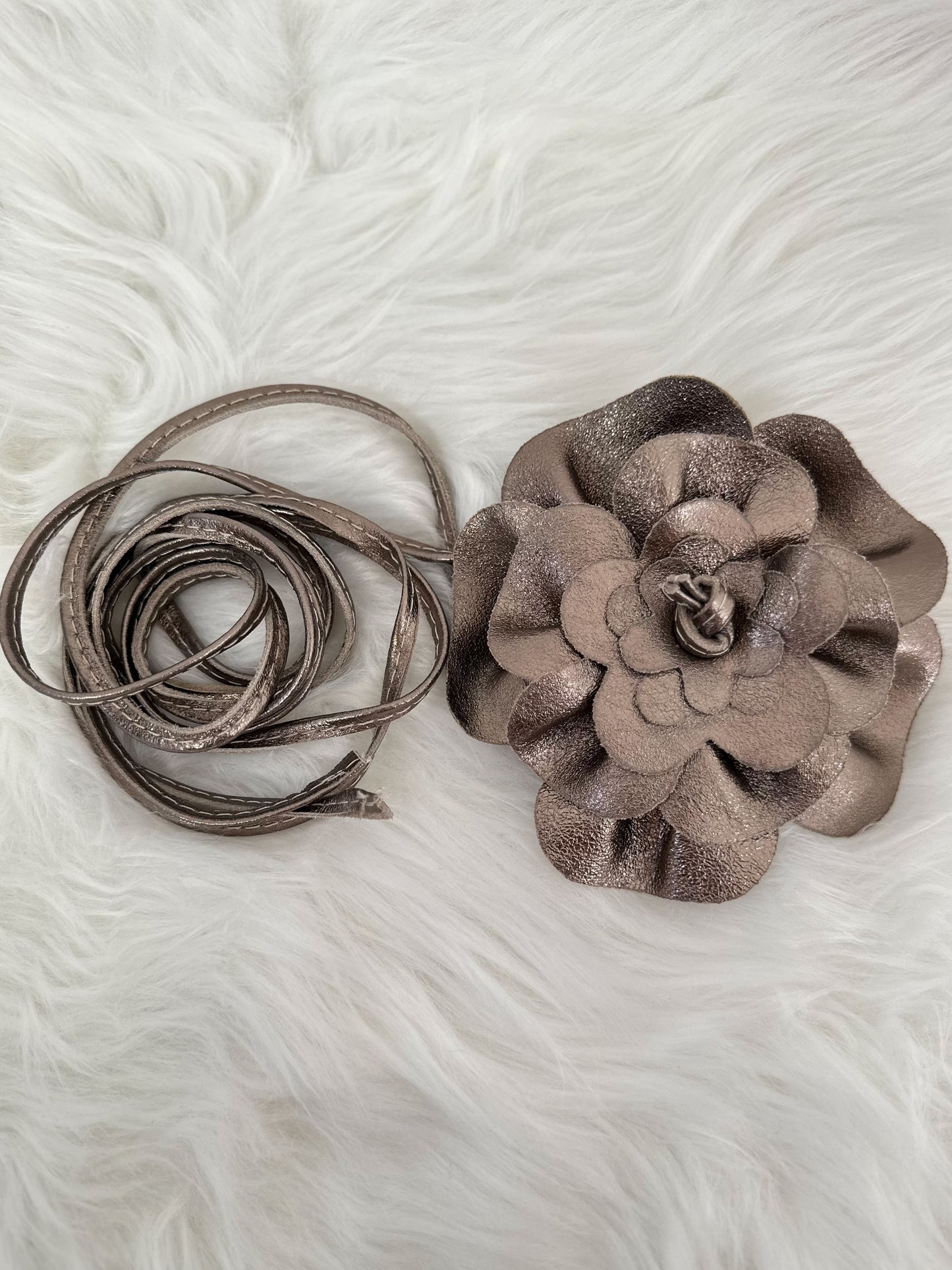 Strikceintuur model "Floral Flow" - brons