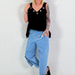Oversized top with silver eyelets - black