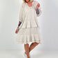 Dress with undershirt top and flounces - beige
