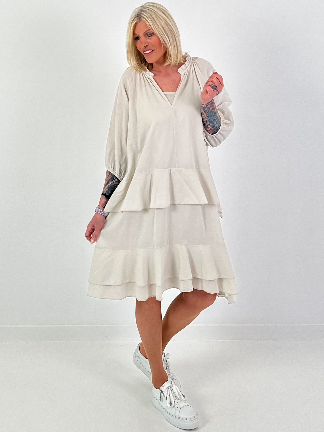 Dress with undershirt top and flounces - beige