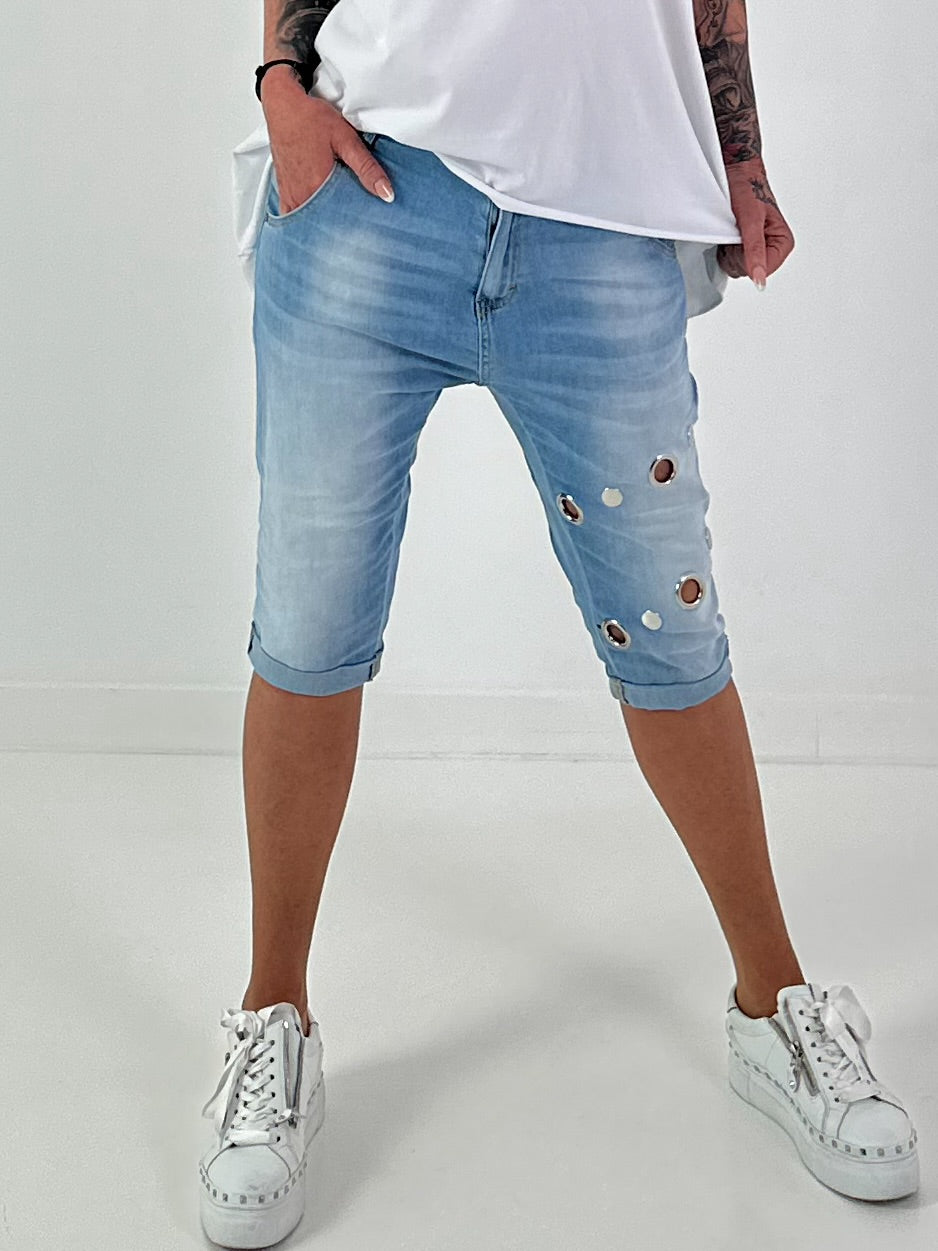 Short jeans with metal eyelets - denim