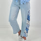 Jeans with floral crochet inserts at the sides - denim