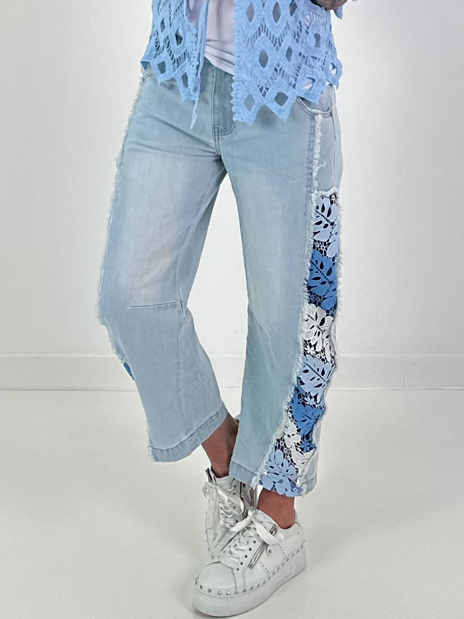 Jeans with floral crochet inserts at the sides - denim