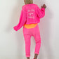 Kurzes Jäckchen mit Rückenprint - neonpink