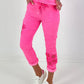 Broek met gehaakte bloemen - neonroze
