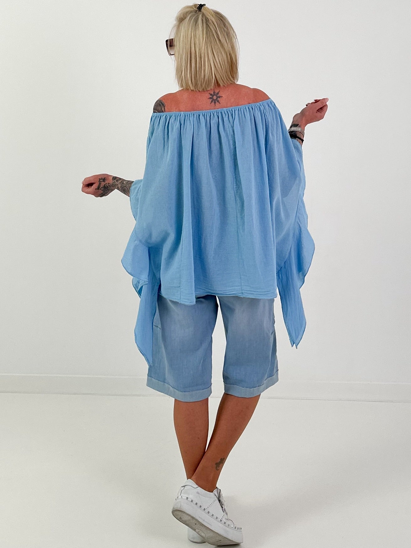 Tunic with side ruffles - light blue