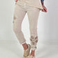 Trousers with crocheted flower inserts - beige