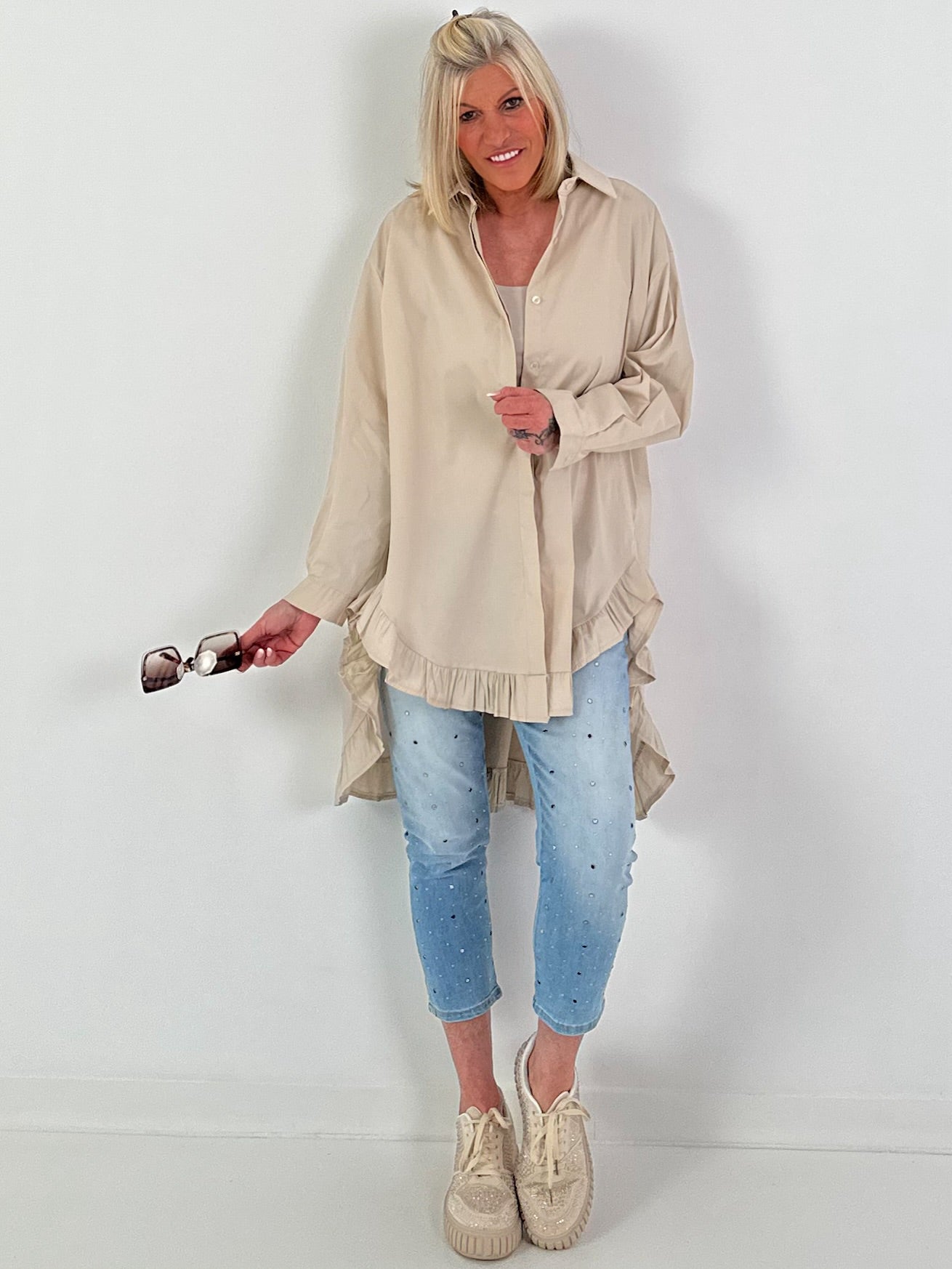Oversized blouse met ruches – beige