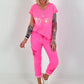 Broek met gehaakte bloemen - neonroze