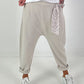 Baggy pants with decorative scarf - beige
