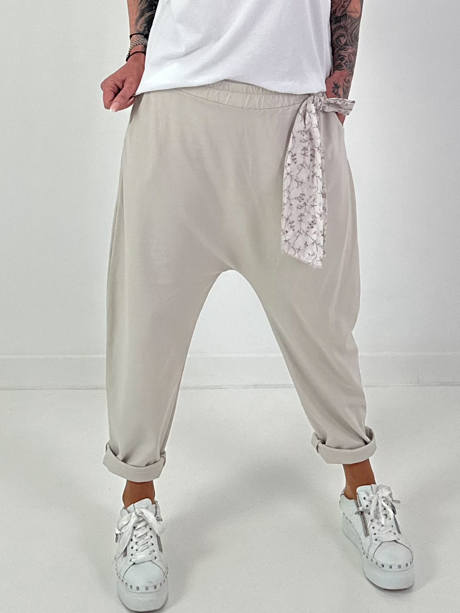 Baggy pants with decorative scarf - beige