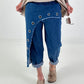 Dark blue jeans with silver eyelets