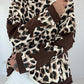 Sweatshirt mit All Over Leo-Print und trendigen Sternelementen - beige