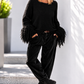 Fringe-look sweater with trumpet sleeves - black