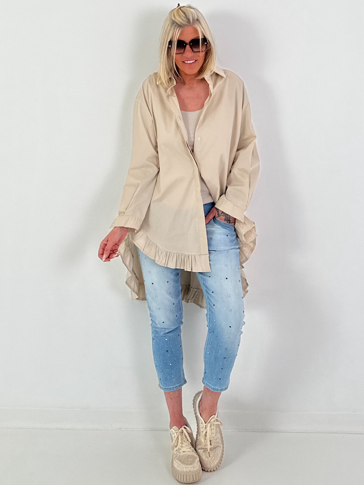 Oversized blouse met ruches – beige