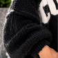 Pullover Iconic - schwarz ( lieferbar ab 07.11.26)