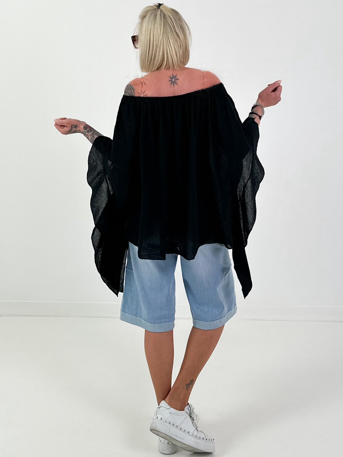 Tunic with side ruffles - black
