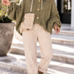 Kuschelige Oversized Strickjacke mit Außennähten - oliv