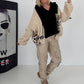 Oversized grofgebreide hoodie met sweat-inzetstuk - zwart-beige