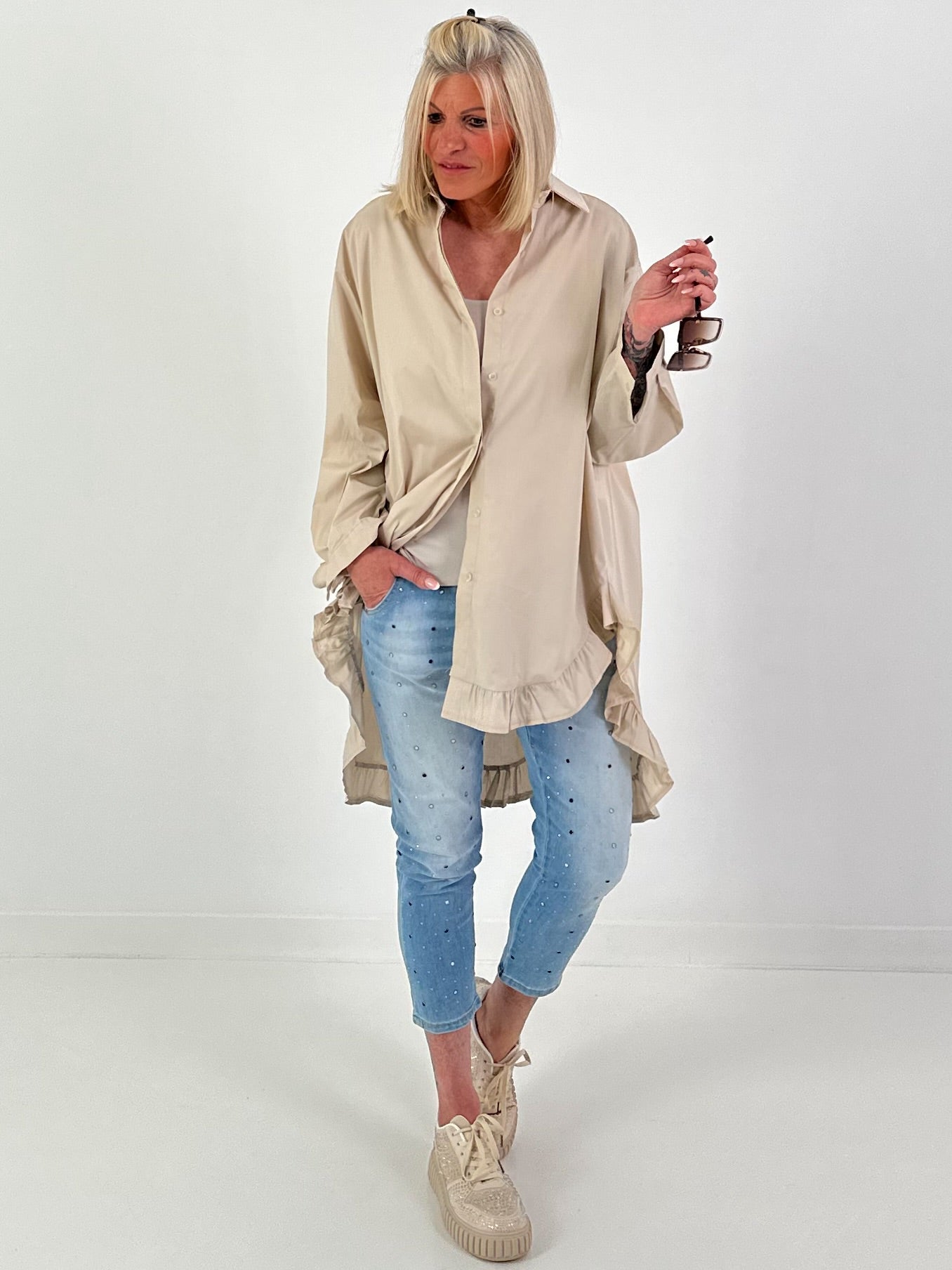 Oversized blouse met ruches – beige