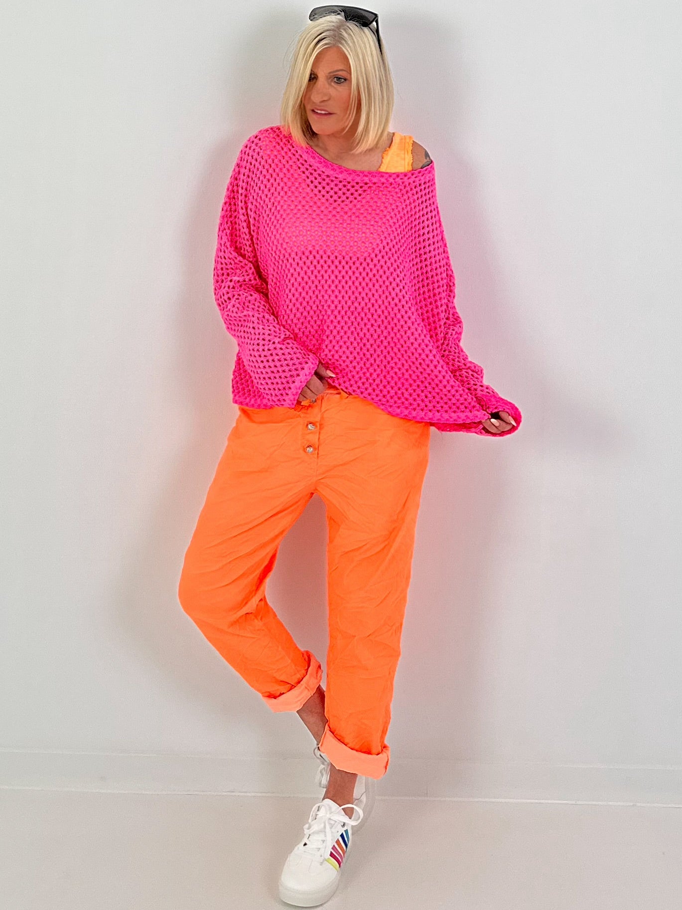 Crochet jumper with back cut-out - neon pink