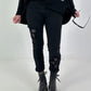 Trousers with crocheted flower inserts - black
