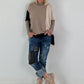 Oversized fijngebreide trui met stulpzakken – beige-taupe-zwart