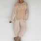 Sweater with knitted inserts - beige