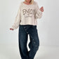 Sweater mit Linksnähten und Print - beige