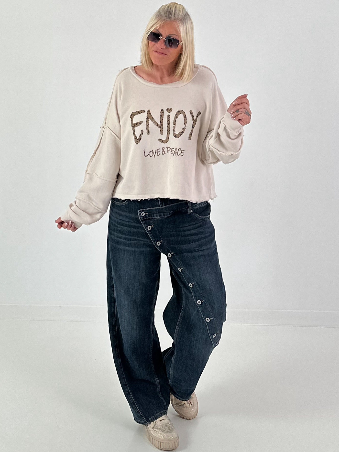 Sweater mit Linksnähten und Print - beige