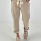 Hose mit goldenen Nieten-Details - beige
