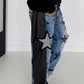 Boyfriend Jeans mit allover Sternen-Print und Ledereinsätzen - schwarz-denim