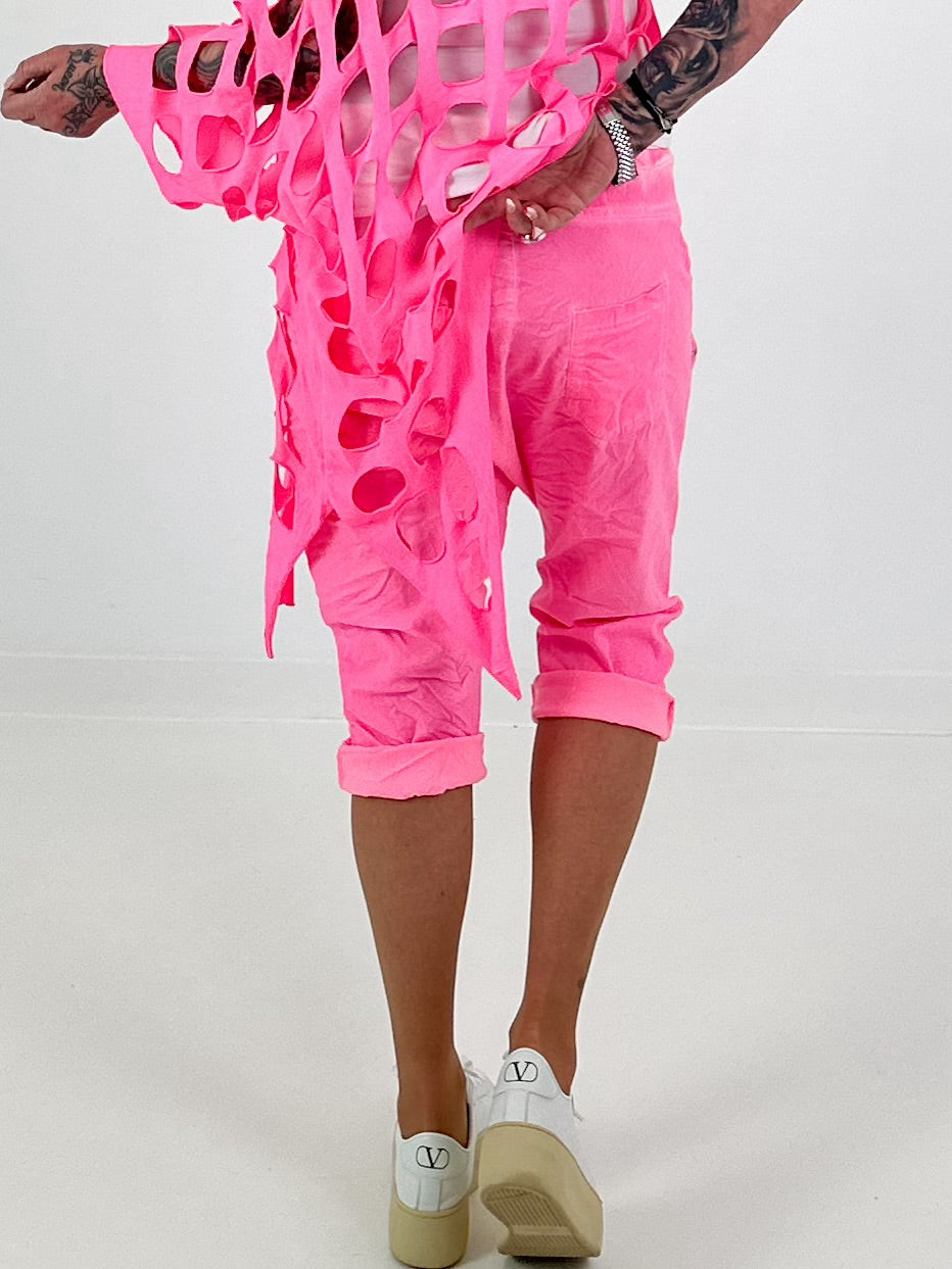Kurze Baggy mit Zipper Details - neonpink