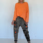 Baggy-Jeans in Used-Optik mit Camouflage-Applikationen - used-denim