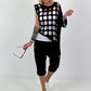 Shirt mit All-Over Cut-Outs und Ösen - schwarz ( lieferbar ab 11.05.26)