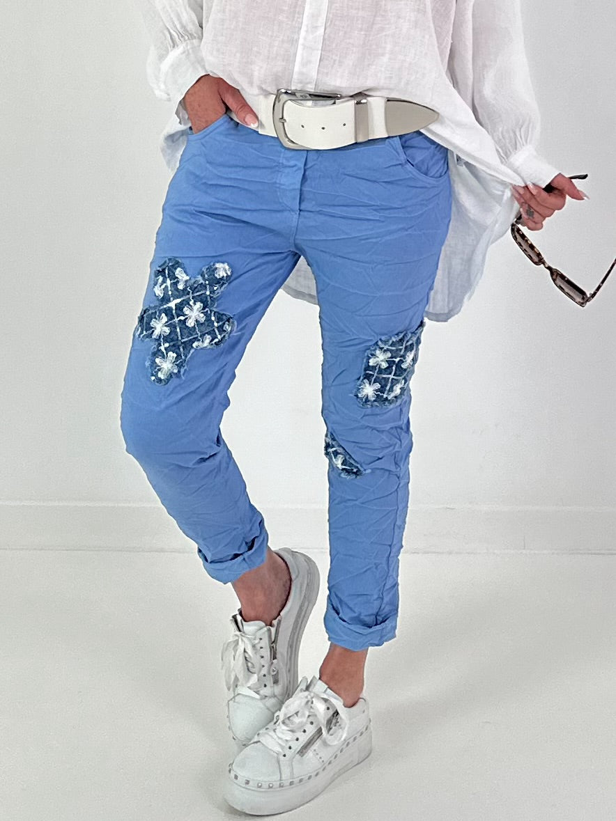Light blue jeans with denim and sequin details