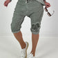 Short baggy shorts with crocheted flowers and sequins - khaki