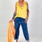 Oversized top with silver eyelets - neon orange