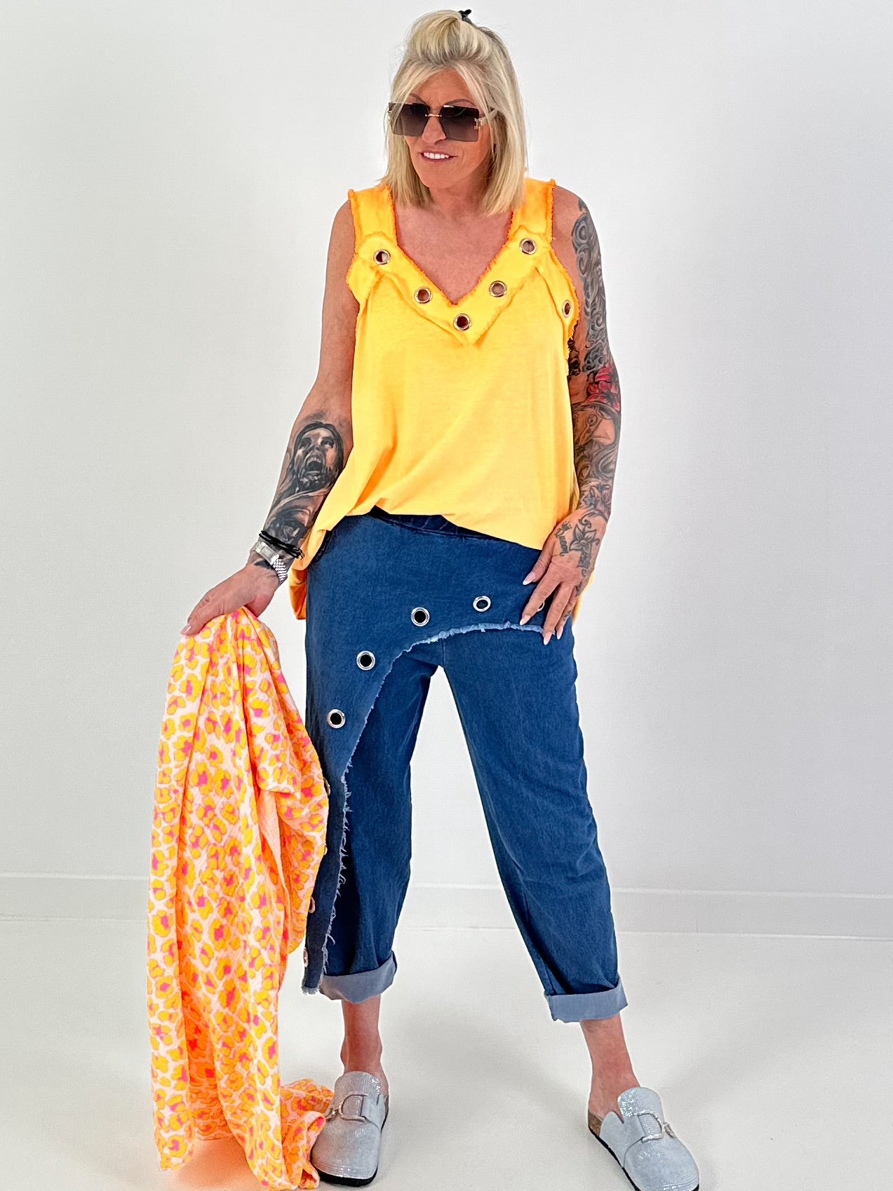 Oversized top with silver eyelets - neon orange