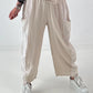 Grobe Hose im Materialmix mit großen Taschen - beige